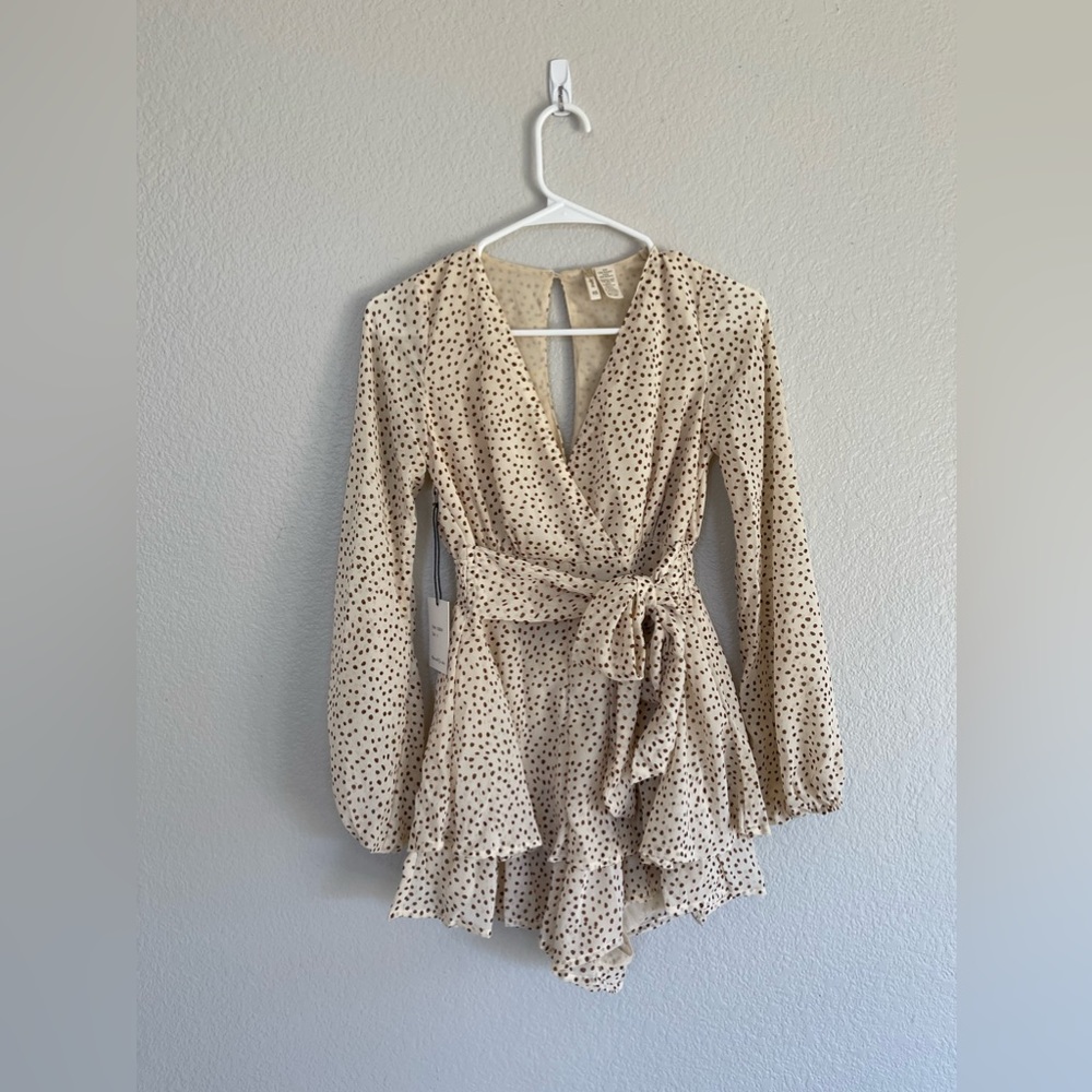 Cream colored polka dot romper